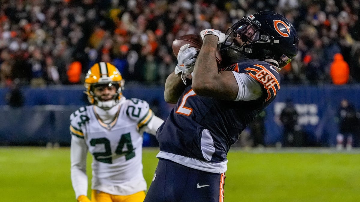 Chicago Bears wide receiver DJ Moore (2) makes the game-winning touchdown catch against the Green Bay Packers during the second half of an NFC Wild Card Round game at Soldier Field on Jan. 10, 2026, in Chicago.