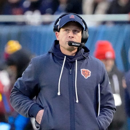 Jan 4, 2026; Chicago, Illinois, USA; Chicago Bears head coach Ben Johnson looks on from the sideline against the Detroit Lions during the first half at Soldier Field.