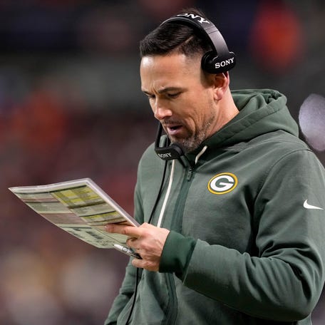 Head coach Matt LaFleur of the Green Bay Packers looks on against the Chicago Bears during the fourth quarter in the NFC Wild Card Playoff game at Soldier Field on January 10, 2026 in Chicago, Illinois.