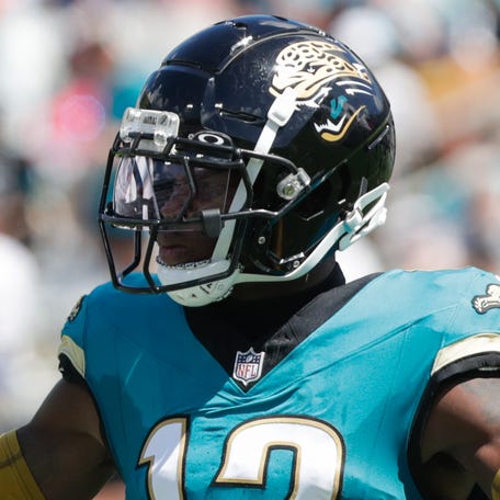 Sep 21, 2025; Jacksonville, Florida, USA; Jacksonville Jaguars defensive back Travis Hunter (12) reacts during the second quarter against the Houston Texans at EverBank Stadium. Mandatory Credit: Travis Register-Imagn Images
