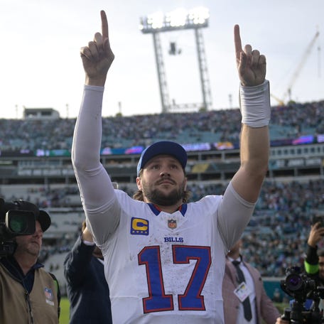 Buffalo Bills quarterback Josh Allen (17) celebrates after an AFC wild-card round win over the Jacksonville Jaguars at EverBank Stadium on Jan. 11, 2026, in Jacksonville, Florida.