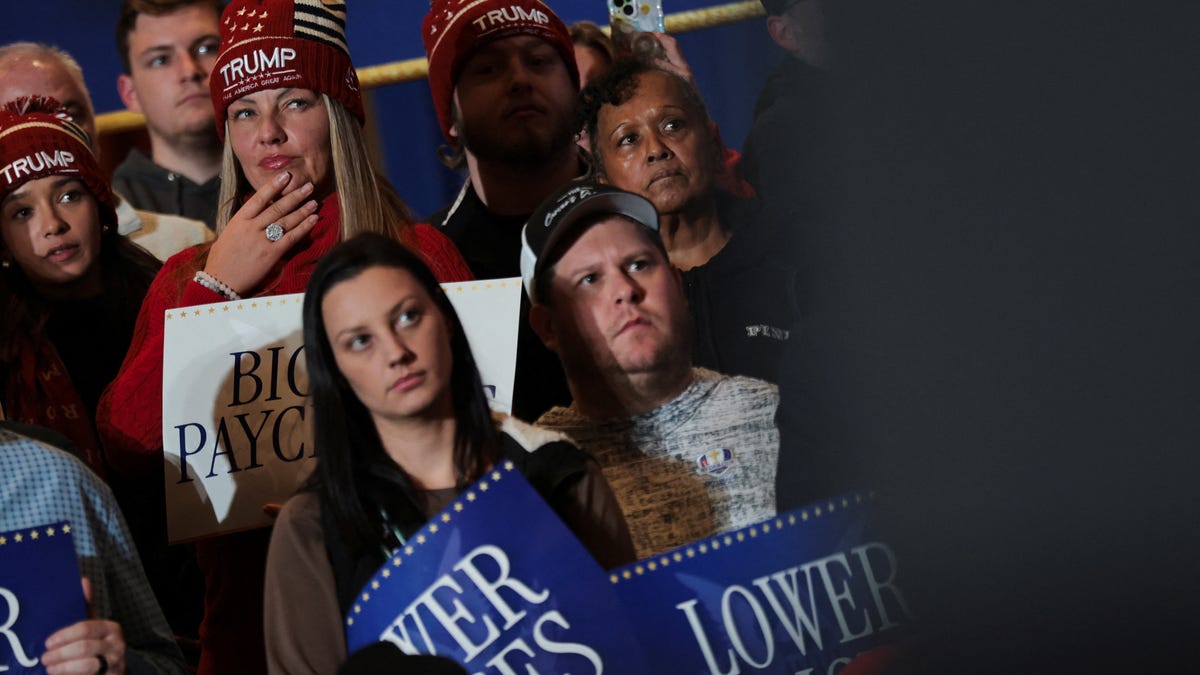 People listen as U.S. President Donald Trump delivers remarks on the U.S. economy and affordability at the Mount Airy Casino Resort in Mount Pocono, Pennsylvania, U.S. December 9, 2025. REUTERS/Jonathan Ernst