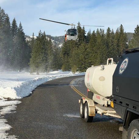 Law enforcement and rescue teams respond to avalanche incident in central Washington on Jan. 10. Two men were killed while backcountry snowmobiling and two others were rescued from the scene.