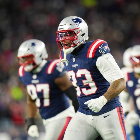 Jan 11, 2026; Foxborough, MA, USA; New England Patriots linebacker Anfernee Jennings (33) celebrates a sack during the fourth quarter against the Los Angeles Chargers in an AFC Wild Card Round game at Gillette Stadium. Mandatory Credit: David Butler II-Imagn Images