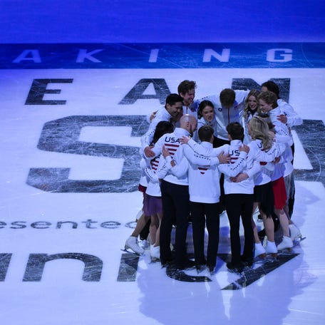 Team USA figure skating team pose for a photo during the 2026 U.S. Figure Skating Championships at Enterprise Center.
