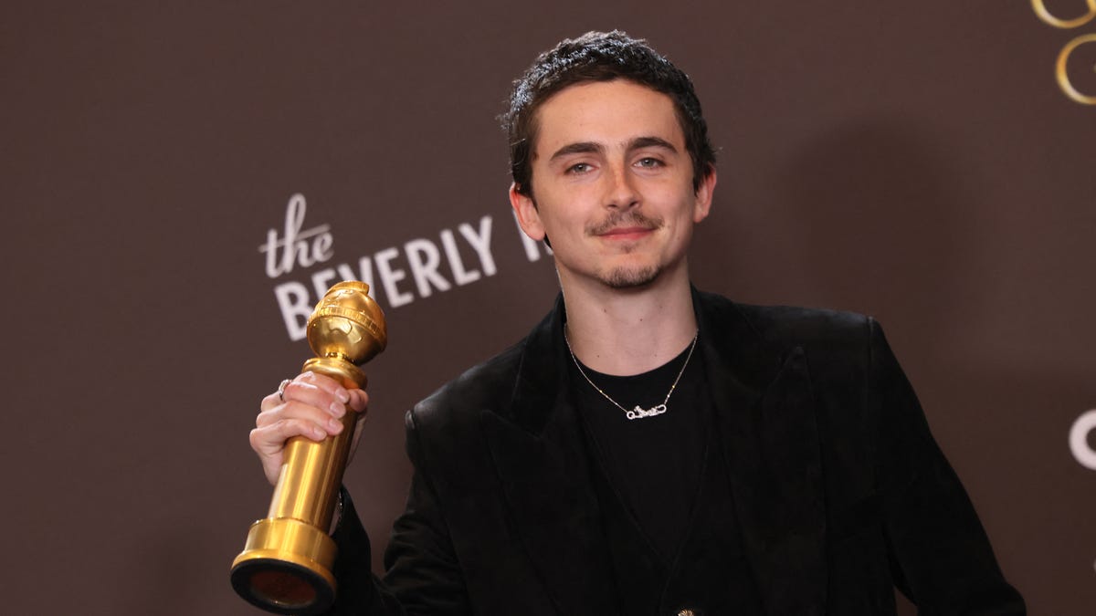 French-US actor Timothee Chalamet poses in the press room with the Best Actor in a Motion Picture Musical or Comedy for "Marty Supreme" during the 83rd annual Golden Globe Awards at the Beverly Hilton hotel in Beverly Hills, California, on January 11, 2026. (Photo by Etienne Laurent / AFP via Getty Images) / -- IMAGE RESTRICTED TO EDITORIAL USE - STRICTLY NO COMMERCIAL USE --