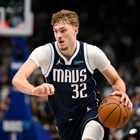 Dallas Mavericks forward Cooper Flagg brings the ball up court during the game against the Philadelphia 76ers on Jan. 1, 2026.