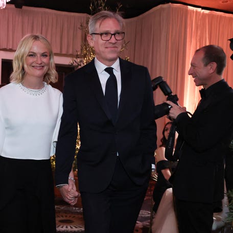 Amy Poehler and Joel Lovell attend the 83rd annual Golden Globe Awards at the Beverly Hilton hotel in Beverly Hills, California, on Jan. 11, 2026.