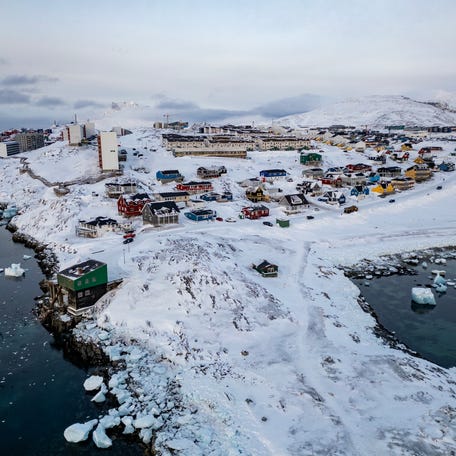 This aerial view shows snow-covered buildings in Nuuk, Greenland on March 7, 2025.