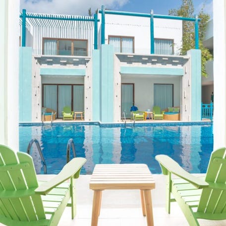 Go with the flow in a swim-up suite at Margaritaville Island Reserve Riviera Cancun.