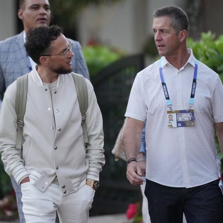 Miami Dolphins head coach Mike McDaniel, left, and Baltimore Ravens head coach John Harbaugh attend the NFL Annual League Meeting at The Breakers.