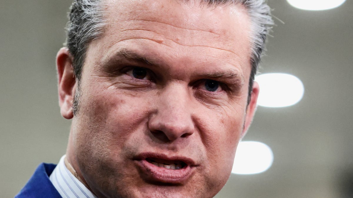 U.S. Defense Secretary Pete Hegseth reacts while he speaks to the media on the day of a briefing for the House of Representatives on the situation in Venezuela, on Capitol Hill in Washington, D.C., U.S., January 7, 2026.