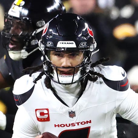 Houston Texans quarterback C.J. Stroud (7) scrambles against the Pittsburgh Steelers at Acrisure Stadium.