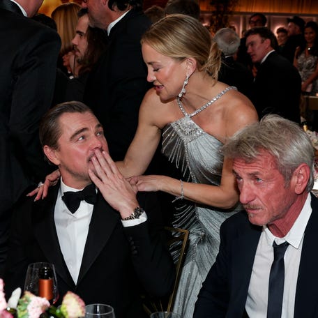 Leonardo DiCaprio, from left, Kate Hudson and Sean Penn attend the 83rd annual Golden Globes at The Beverly Hilton in Beverly Hills, California, on Jan. 11, 2026.