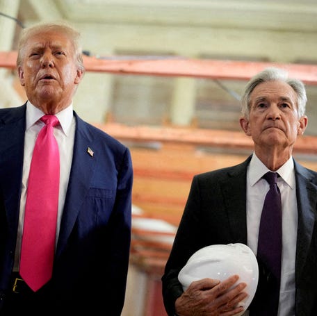 President Donald Trump and Federal Reserve Chair Jerome Powell speak to reporters during a tour of the renovation of the Federal Reserve Board's building in Washington, DC, on July 24, 2025.