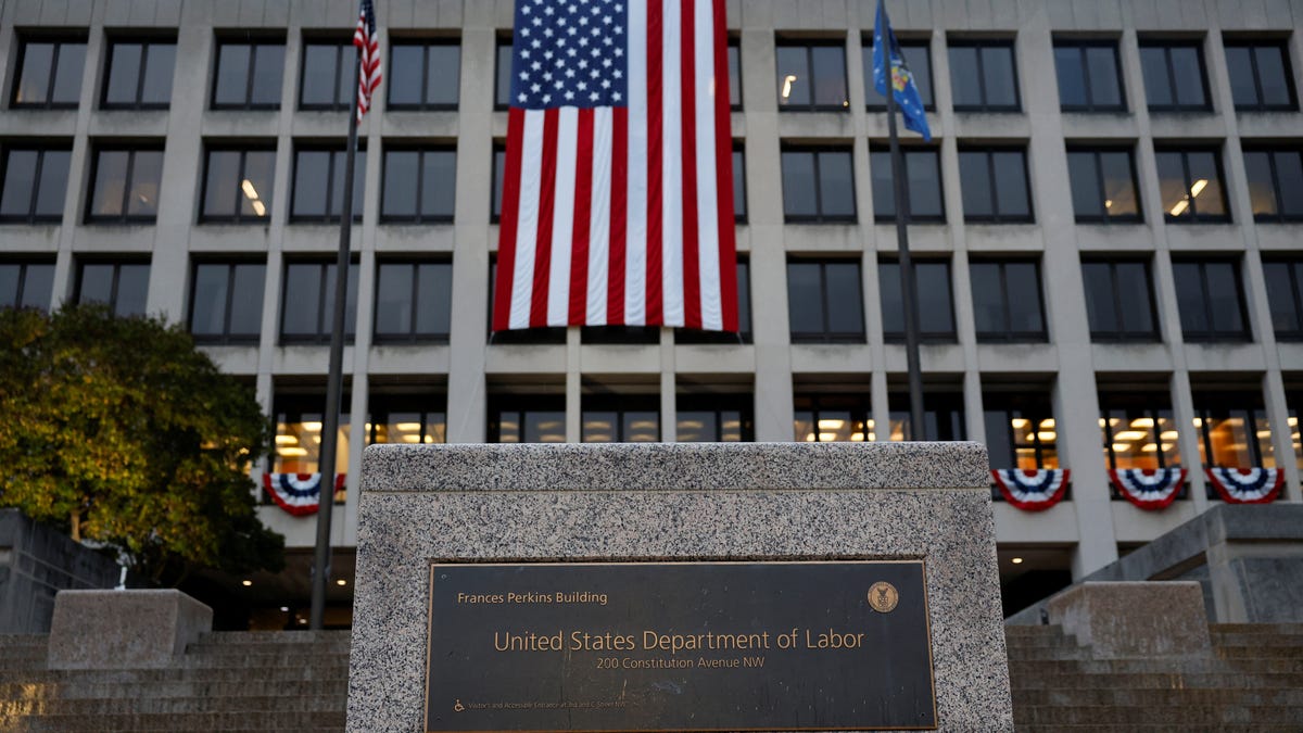 An American flag hangs on the Department of Labor headquarters, in Washington, D.C., U.S., September 16, 2025.