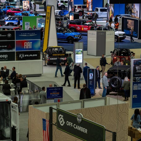 Visitors walk through exhibits during the 2026 Detroit Auto Show inside Huntington Place in Detroit on Wednesday, Jan. 14, 2026.