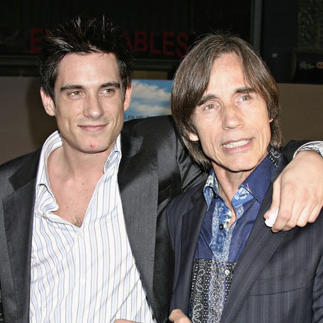 Ethan Browne, left, and his father, Jackson Browne, attend the "Raising Helen" premiere at El Capitan Theatre in Hollywood, California, on May 26, 2004.