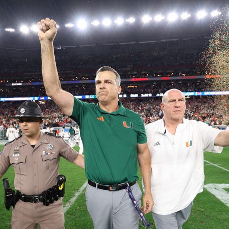 GLENDALE, ARIZONA - JANUARY 08: Head coach Mario Cristobal of the Miami Hurricanes celebrates after the game against the Ole Miss Rebels during the 2025 College Football Playoff Semifinal at the VRBO Fiesta Bowl at State Farm Stadium on January 08, 2026 in Glendale, Arizona. The Hurricanes defeated the Rebels 31-27. (Photo by Christian Petersen/Getty Images)