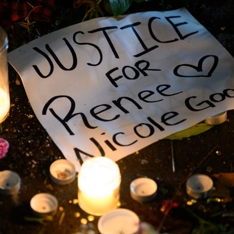 A sign reading "Justice for Renee Nicole Good" lays next to LED candles during a protest at the U.S. Immigration and Customs Enforcement facility on January 9, 2026 in Portland, Oregon.