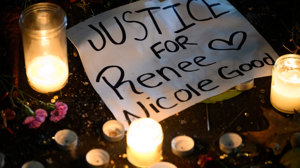 A sign reading "Justice for Renee Nicole Good" lays next to LED candles during a protest at the U.S. Immigration and Customs Enforcement facility on January 9, 2026 in Portland, Oregon.