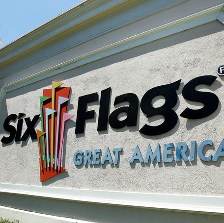 Signage sits near the entrance to Six Flags Great America in this file photo from May 24, 2005.