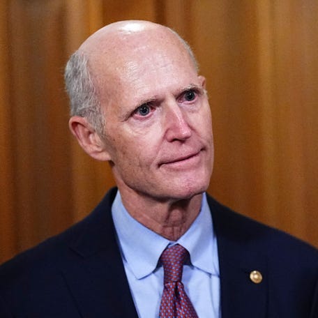 Senator Rick Scott (R-FL) speaks to reporters outside the Senate Chamber in Washington, D.C., U.S., November 9, 2025.