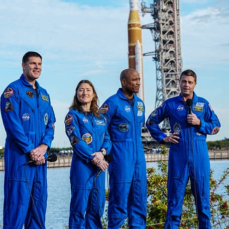 The crew of Artemis II (from left: Mission Specialist Jeremy Hansen, Mission Specialist Christina Koch, Pilot Victor Glover and Commander Reid Wiseman) answer questions at a press conference as their Space Launch System rocket is transported to Pad 39B January 17, 2026. Artemis II is tentatively scheduled to launch on a mission to th Moon in early February. Craig Bailey/FLORIDA TODAY via USA TODAY NETWORK