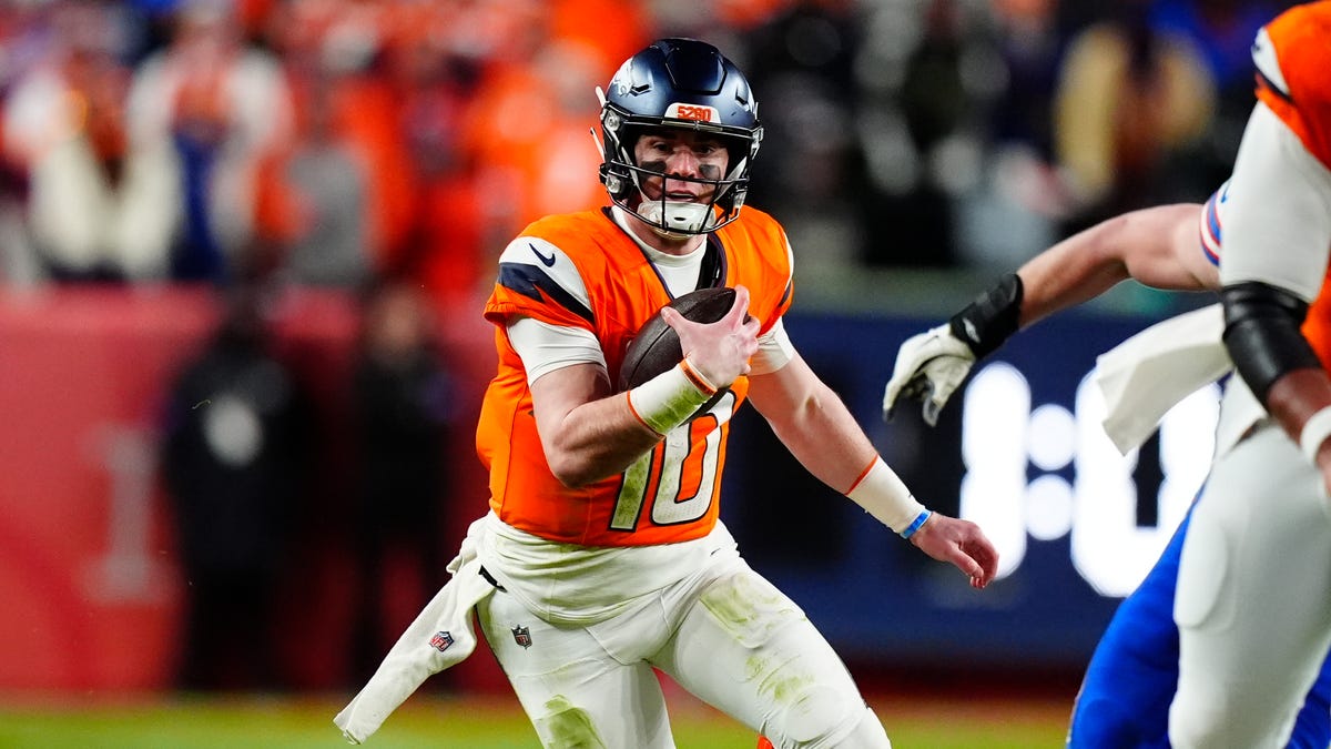 Jan 17, 2026; Denver, CO, USA; Denver Broncos quarterback Bo Nix (10) runs during the fourth quarter of an AFC Divisional Round playoff game against the Buffalo Bills at Empower Field at Mile High.