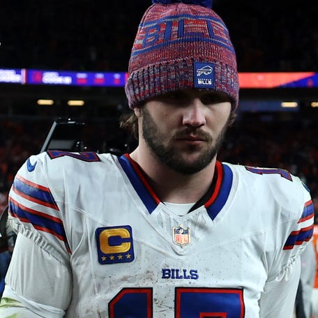 DENVER, COLORADO - JANUARY 17: Josh Allen #17 of the Buffalo Bills walks off the field after being defeated by the Denver Broncos with a score of 30 to 33 in overtime of the AFC Divisional Playoff game at Empower Field At Mile High on January 17, 2026 in Denver, Colorado. (Photo by Matthew Stockman/Getty Images)