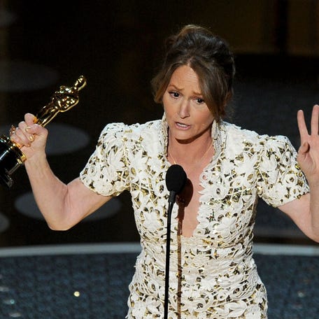 Melissa Leo accepts the Oscar for best supporting actress during the 83rd Academy Awards on Feb. 27, 2011.