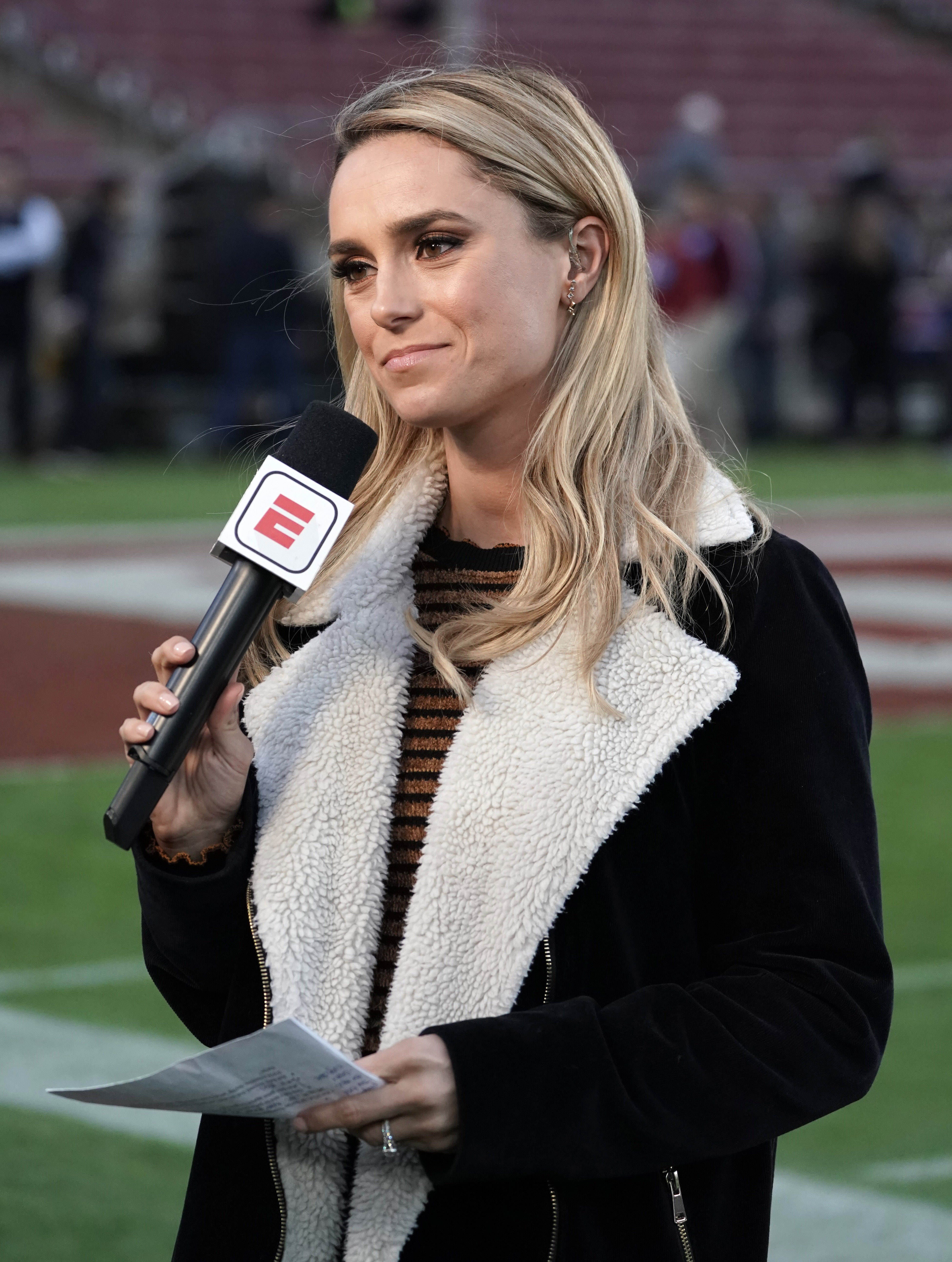ESPN sideline reporter Molly McGrath during the NCAA game between the Stanford Cardinal and UCLA Bruins at Stanford Stadium.