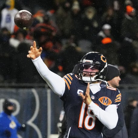 Jan 18, 2026; Chicago, IL, USA; Chicago Bears quarterback Caleb Williams (18) throws a pass during warmups before an NFC Divisional Round game against the Los Angeles Rams at Soldier Field.
