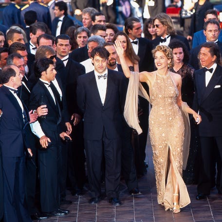 Sharon Stone and Fashion Designer Valentino attend the Closing Ceremony of the 48th Annual Cannes Film Festival on May 28, 1995 in Cannes, France.