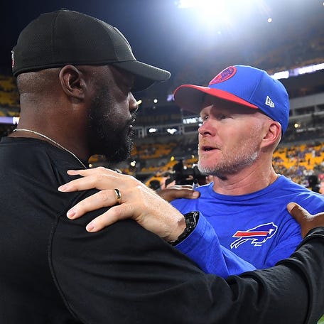 PITTSBURGH, PENNSYLVANIA - AUGUST 19: Head coach Mike Tomlin of the Pittsburgh Steelers talks with head coach Sean McDermott of the Buffalo Bills after a 27-15 Steelers win during a preseason game at Acrisure Stadium on August 19, 2023 in Pittsburgh, Pennsylvania. (Photo by Joe Sargent/Getty Images)