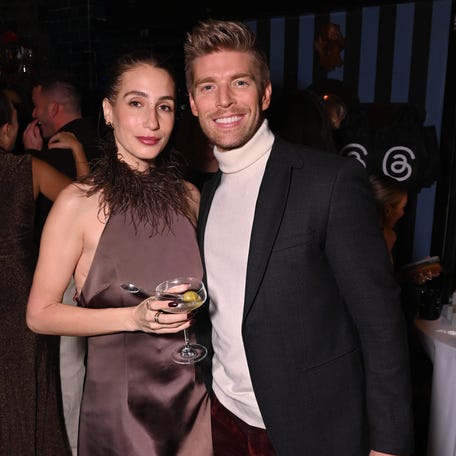 NEW YORK, NEW YORK - DECEMBER 10: (L-R) Amanda Batula and Kyle Cooke attend Threads Reality TV Holiday Dinner co-hosted by Amanda Hirsch (@notskinnybutnotfat) and VP of Threads Product, Emily Dalton Smith in NYC at The Golden Swan on December 10, 2025 in New York City. (Photo by Bryan Bedder/Getty Images for Threads)