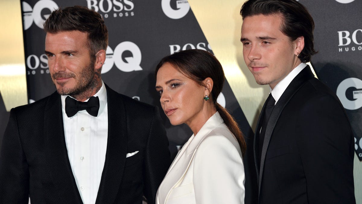 David Beckham, Victoria Beckham, and their son Brooklyn Beckham attend the GQ Men Of The Year Awards at Tate Modern on Sept. 3, 2019, in London.