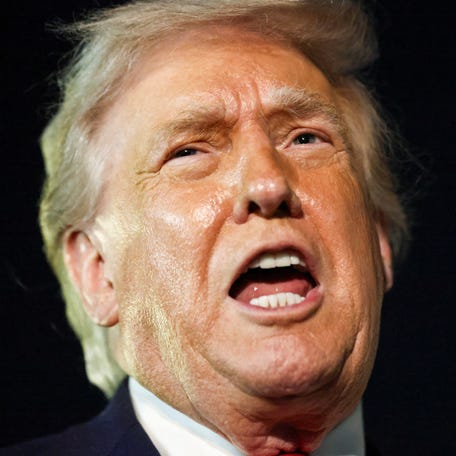 U.S. President Donald Trump speaks to members of the media ahead of boarding Air Force One to depart for Washington, at Palm Beach International Airport in West Palm Beach, Florida, U.S., January 19, 2026.