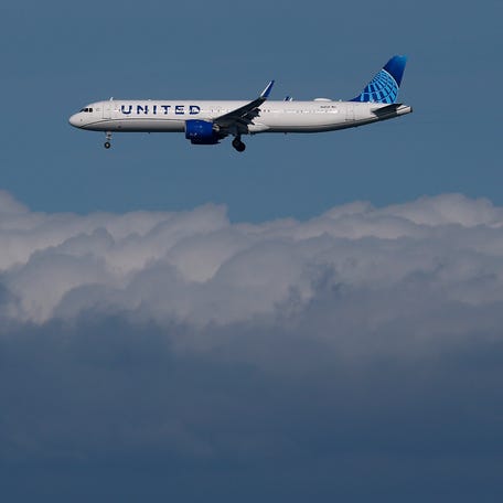 SAN FRANCISCO, CALIFORNIA - NOVEMBER 07: A United Airlines plane prepares to land at San Francisco International Airport (SFO) on November 07, 2025 in San Francisco, California.