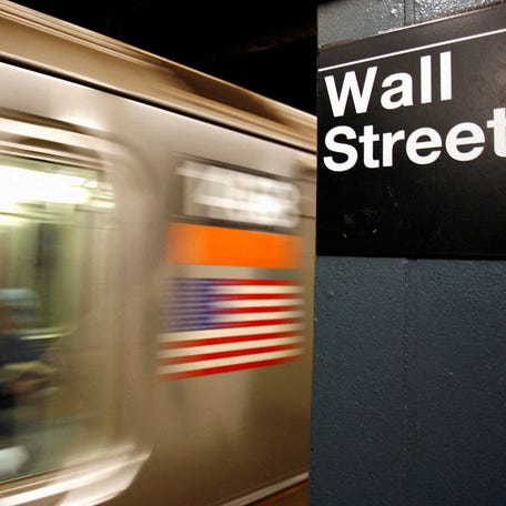 FILE PHOTO: A Wall Street subway stop sign is seen in New York October 10, 2008. REUTERS/Shannon Stapleton/File Photo