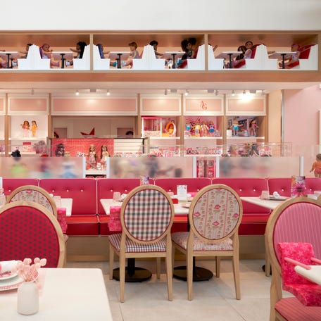 The inside of the American Girl Doll Café location in Dallas, Texas is shown. People are choosing to go to the cafés as adults as a way to experience some childhood whimsy, some attendees told USA TODAY.