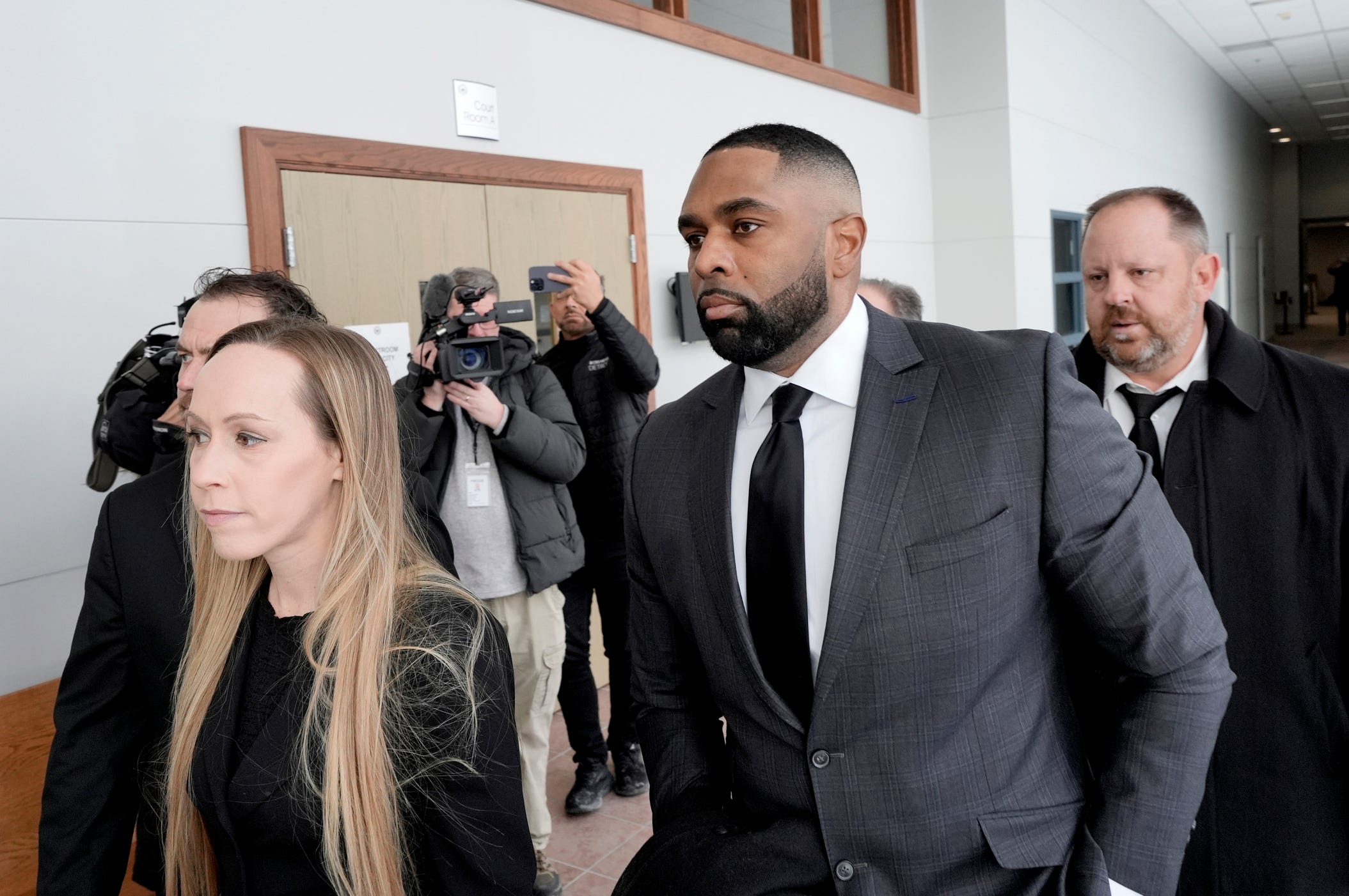 Former Michigan head football coach Sherrone Moore arrives at Washtenaw County 14A-1 District Court in Ann Arbor for a probable cause conference on Thursday, Jan. 22, 2026.