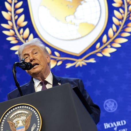 President Donald Trump speaks during a charter announcement for his Board of Peace initiative aimed at resolving global conflicts, alongside the 56th annual World Economic Forum (WEF), in Davos, Switzerland, January 22, 2026.