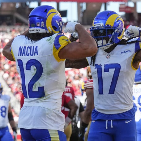 Nov 9, 2025; Santa Clara, California, USA; Los Angeles Rams wide receiver Puka Nacua (12) and Los Angeles Rams wide receiver Davante Adams (17) celebrate after a touchdown during the first quarter against the San Francisco 49ers at Levi's Stadium. Mandatory Credit: Cary Edmondson-Imagn Images