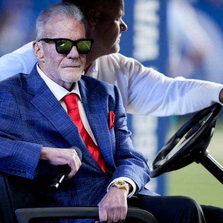 Indianapolis Colts owner Jim Irsay sits in a golf cart during a Ring of Honor ceremony for Dallas Clark during a game against the Miami Dolphins at Lucas Oil Stadium.