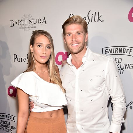 Amanda Batula and Kyle Cooke attend the OK! Magazine summer kickoff party at Magic Hour at Moxy Times Square on May 15, 2018, in New York City.