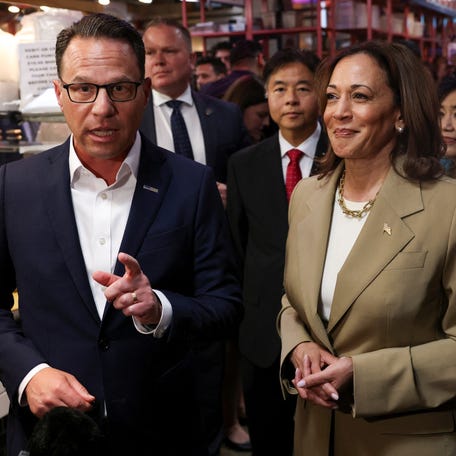 U.S. Vice President Kamala Harris and Pennsylvania Governor Josh Shapiro visit the Reading Terminal Market in Philadelphia, Pennsylvania, U.S., July 13, 2024. REUTERS/Kevin Mohatt