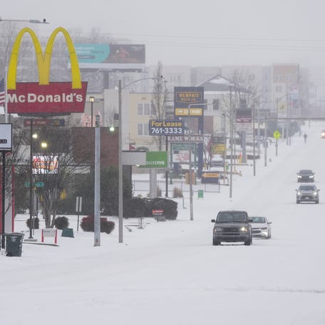Union Avenue is seen covered in snow in Memphis, Tenn., on January 24, 2026. A winter storm brought severe weather and frigid temperatures to Memphis late January 23rd.