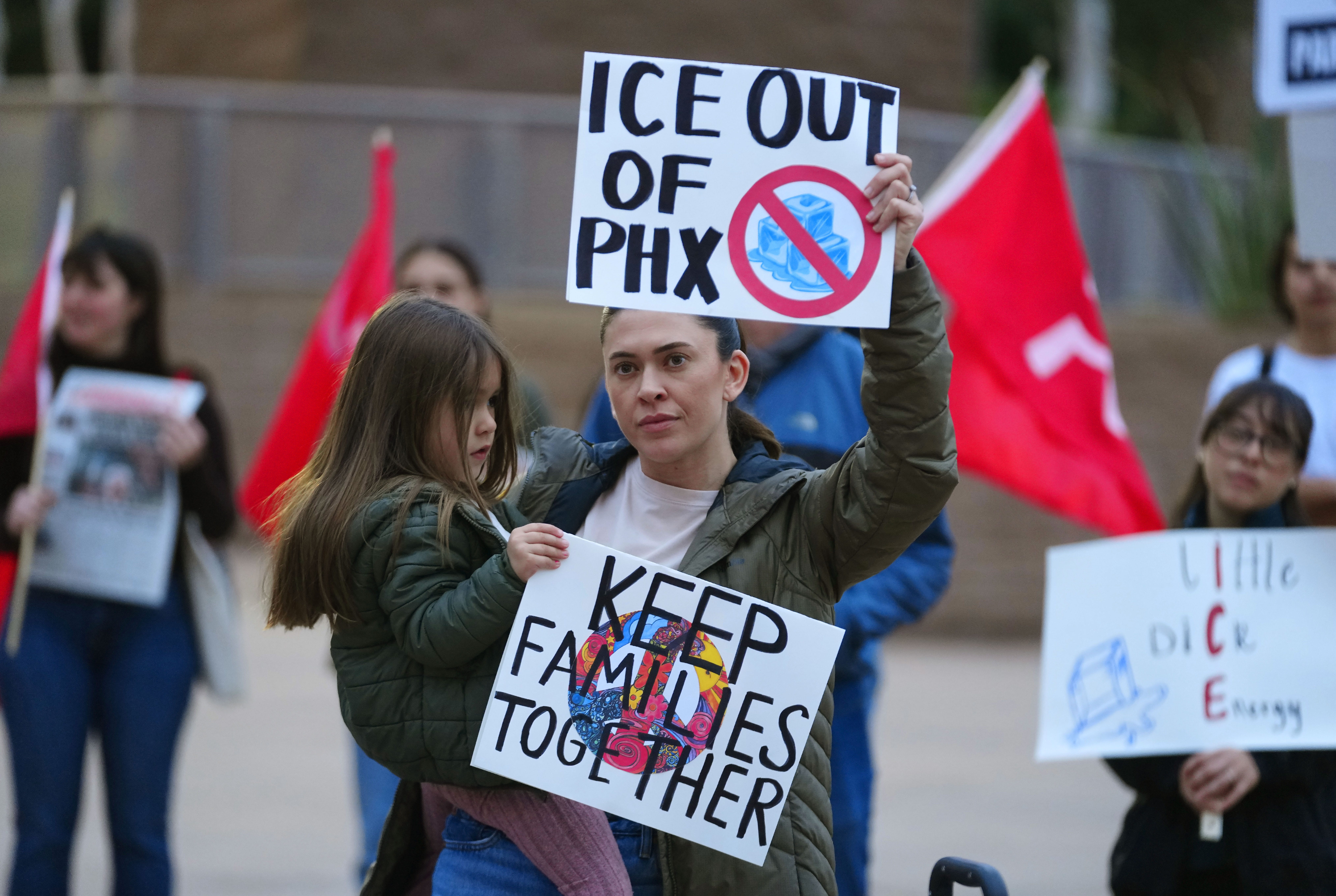More than 300 people marched to Mesa Gateway Airport, calling for an end to local participation in federal immigration enforcement programs.