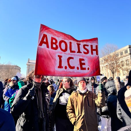 Protesters rally against Immigration and Customs Enforcement on Jan. 25, 2026, in Iowa City, Iowa.